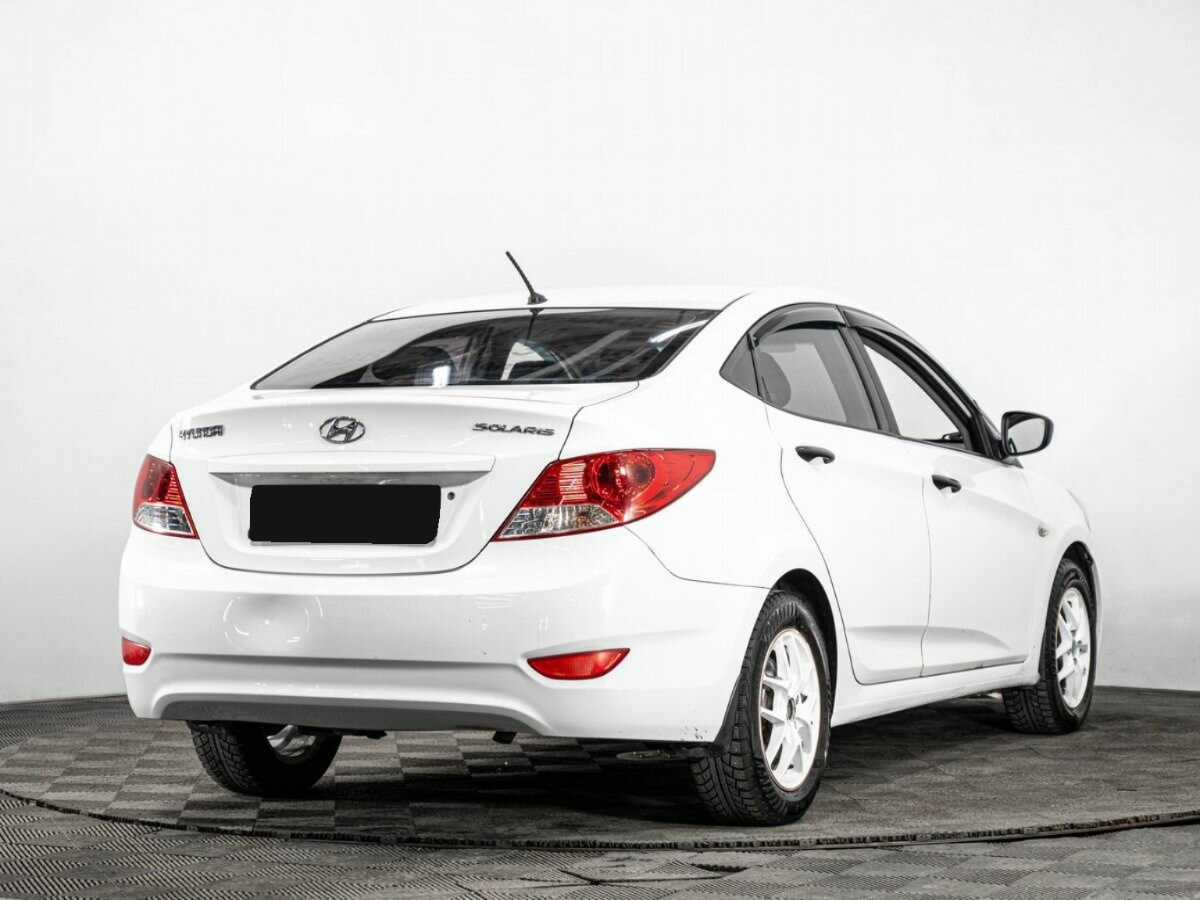 Hyundai Solaris с пробегом — 2013 год. Фото: #3