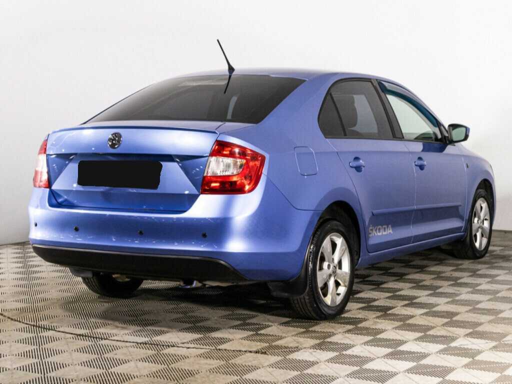 Skoda Rapid с пробегом — 2014 год. Фото: #4