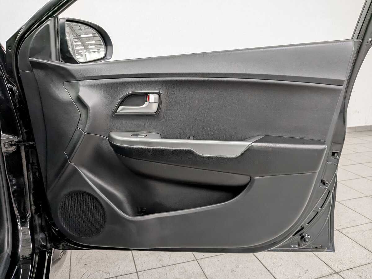 Kia Rio с пробегом — 2013 год. Фото: #21