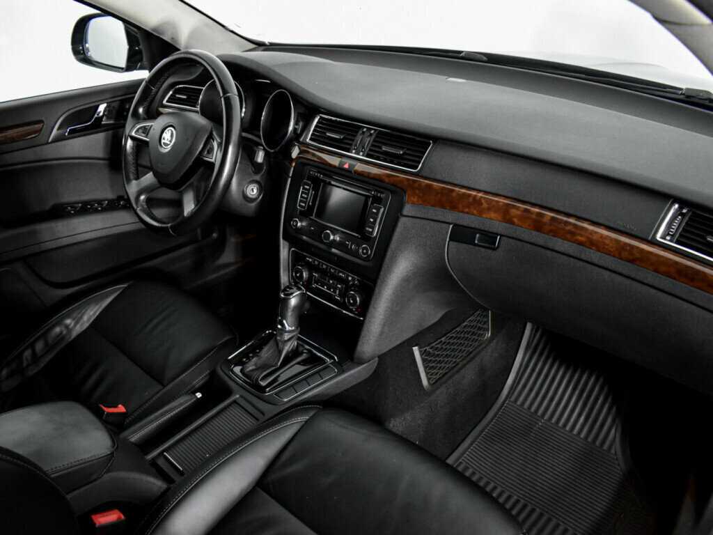 Skoda Superb с пробегом — 2013 год. Фото: #9