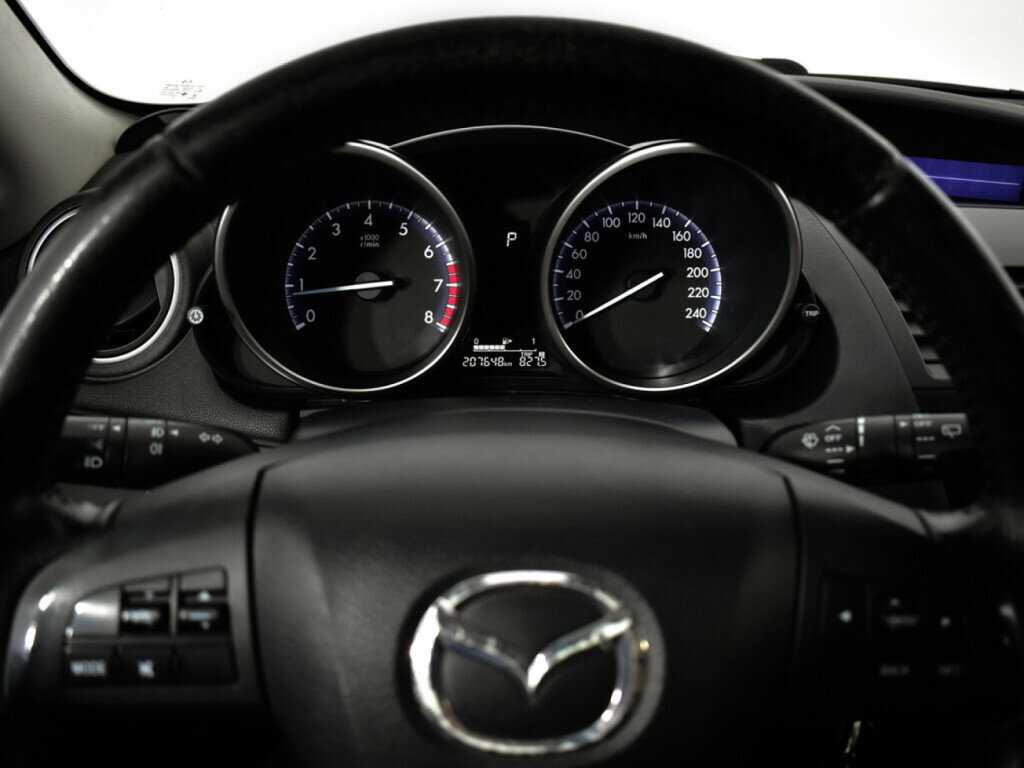 Mazda 3 с пробегом — 2012 год. Фото: #10