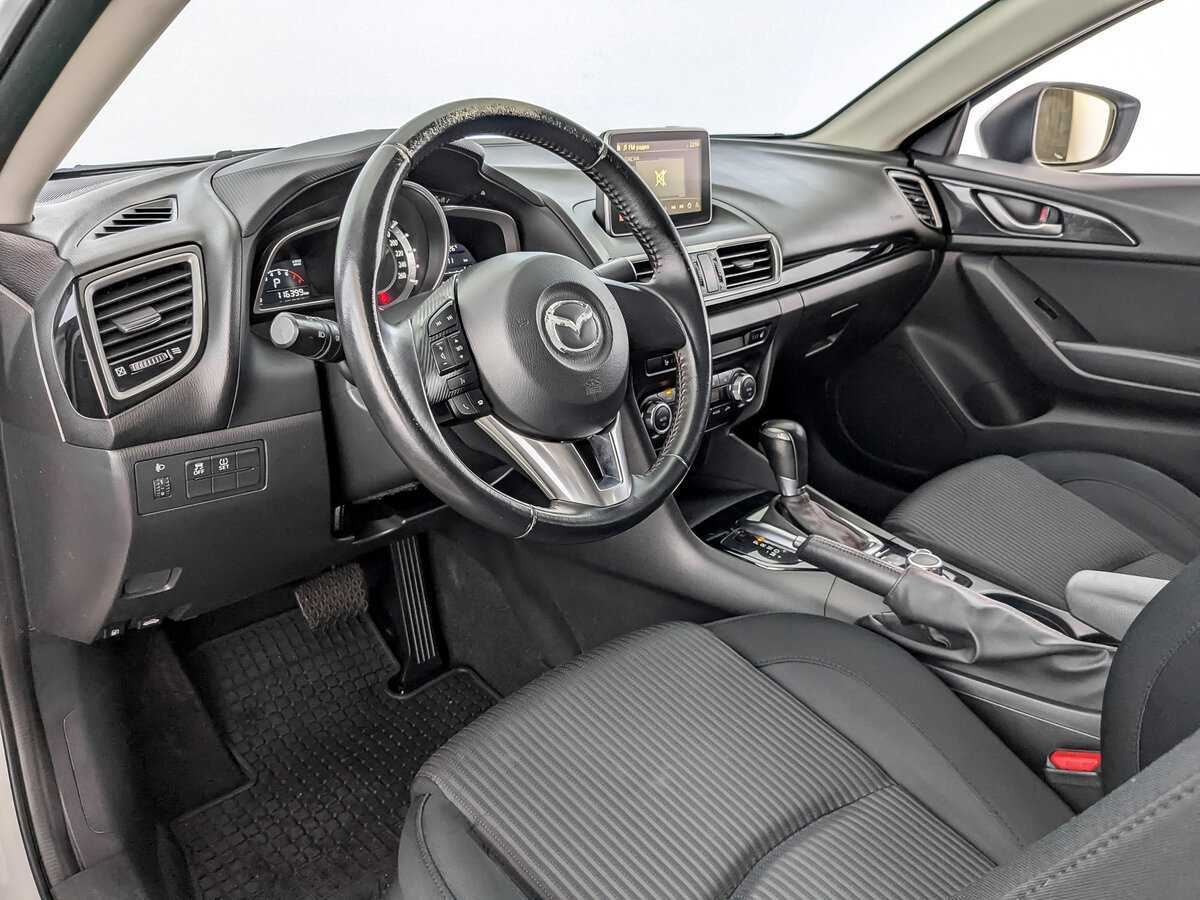 Mazda 3 с пробегом — 2015 год. Фото: #15