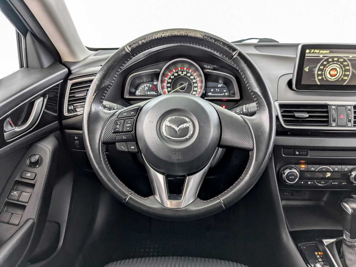 Mazda 3 с пробегом — 2015 год. Фото: #20