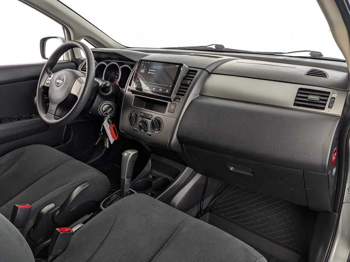 Nissan Tiida с пробегом — 2013 год. Фото: #12