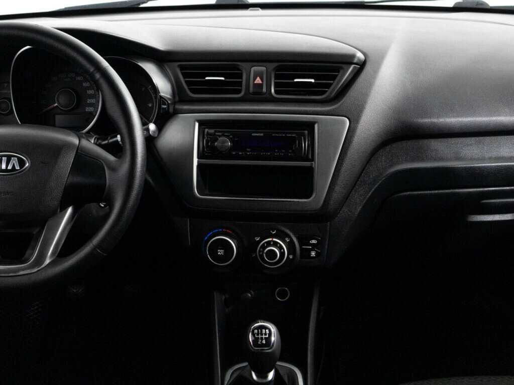 Kia Rio с пробегом — 2013 год. Фото: #13