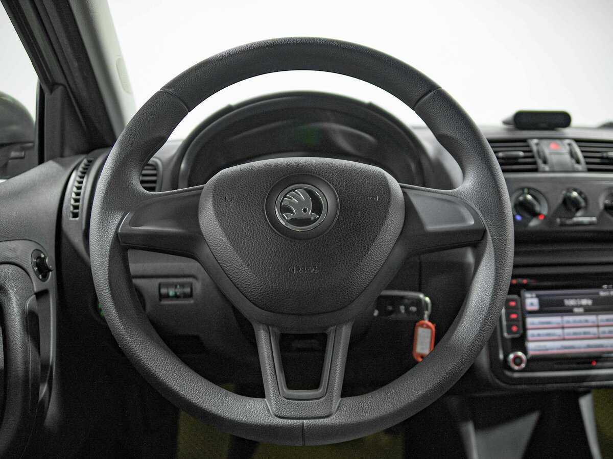 Skoda Fabia с пробегом — 2013 год. Фото: #7