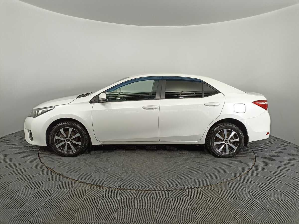 Toyota Corolla с пробегом — 2013 год. Фото: #7