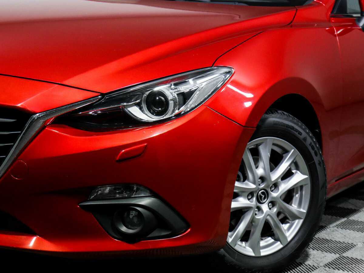 Mazda 3 с пробегом — 2014 год. Фото: #12