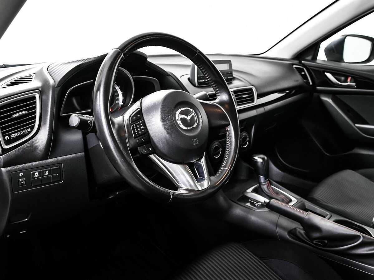 Mazda 3 с пробегом — 2013 год. Фото: #11