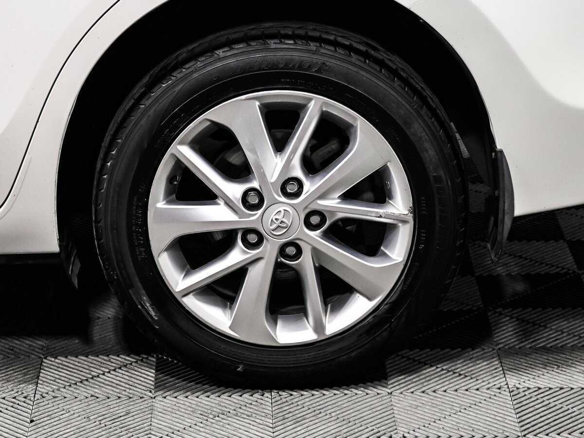 Toyota Corolla с пробегом — 2013 год. Фото: #12