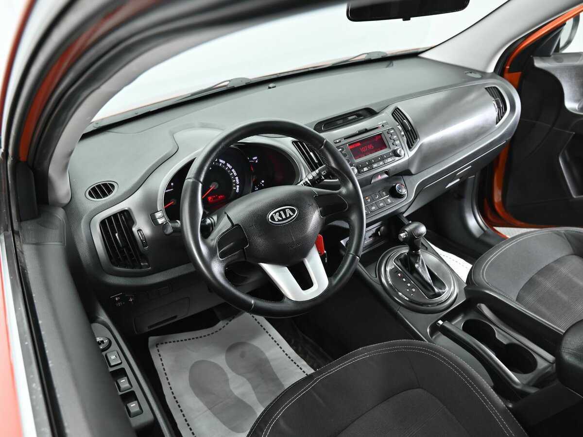 Kia Sportage с пробегом — 2012 год. Фото: #7