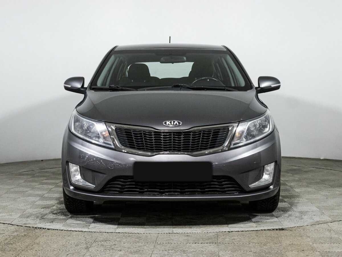 Kia Rio с пробегом — 2013 год. Фото: #1