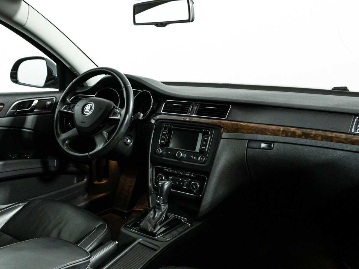 Skoda Superb с пробегом — 2013 год. Фото: #8