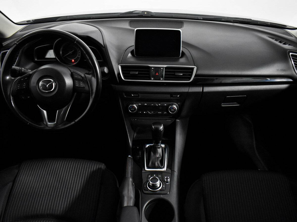Mazda 3 с пробегом — 2014 год. Фото: #14