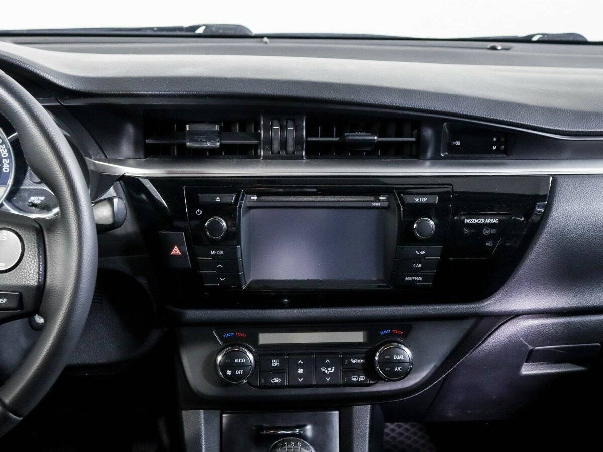 Toyota Corolla с пробегом — 2014 год. Фото: #9