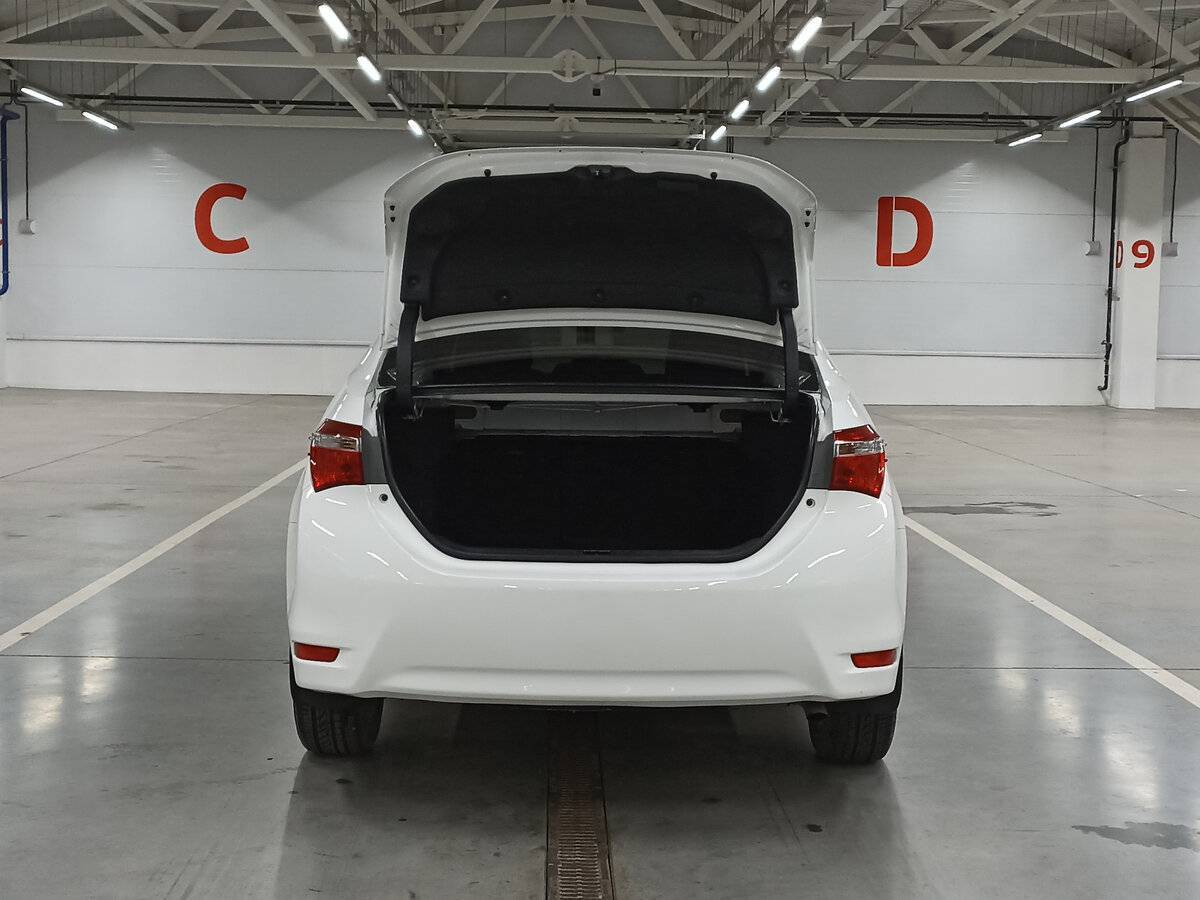 Toyota Corolla с пробегом — 2013 год. Фото: #9