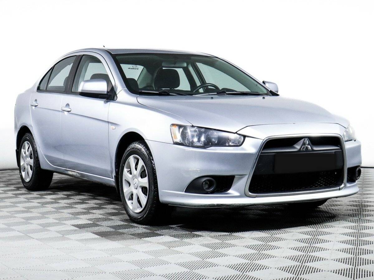Mitsubishi Lancer с пробегом — 2014 год. Фото: #2