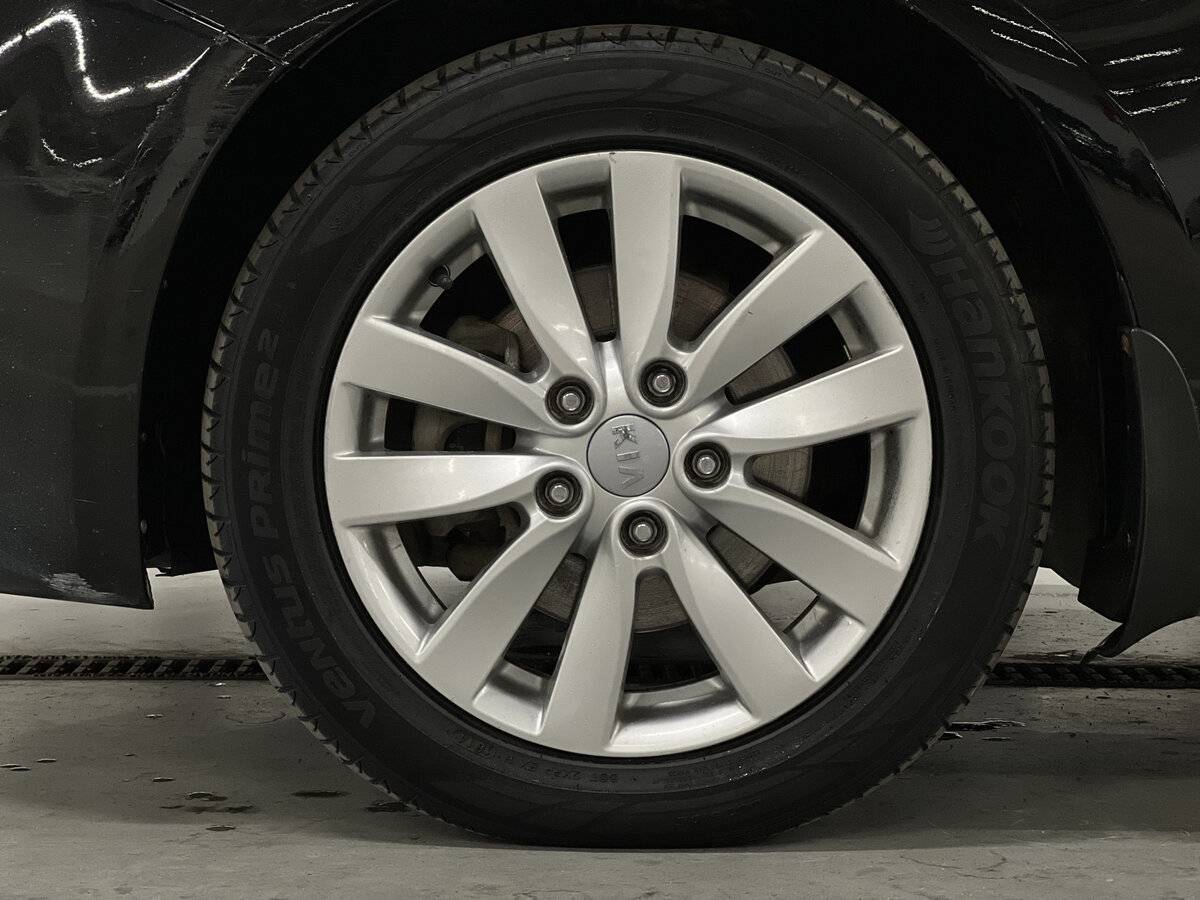 Kia Cerato с пробегом — 2014 год. Фото: #17