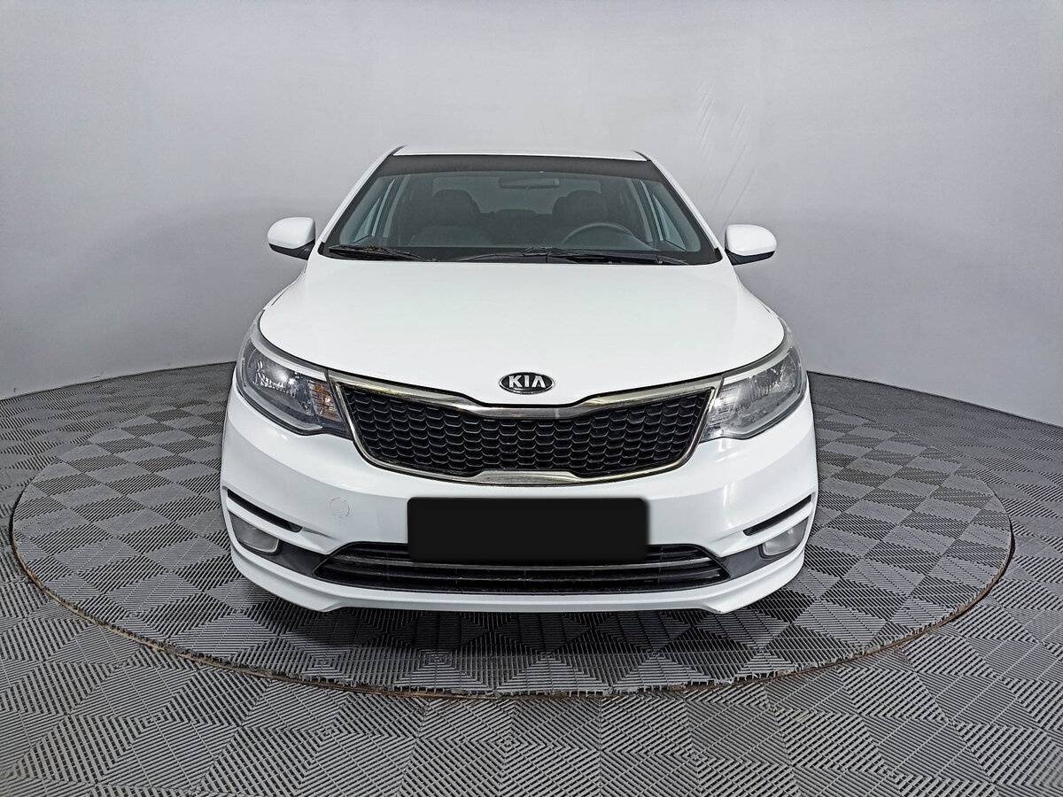 Kia Rio с пробегом — 2015 год. Фото: #1