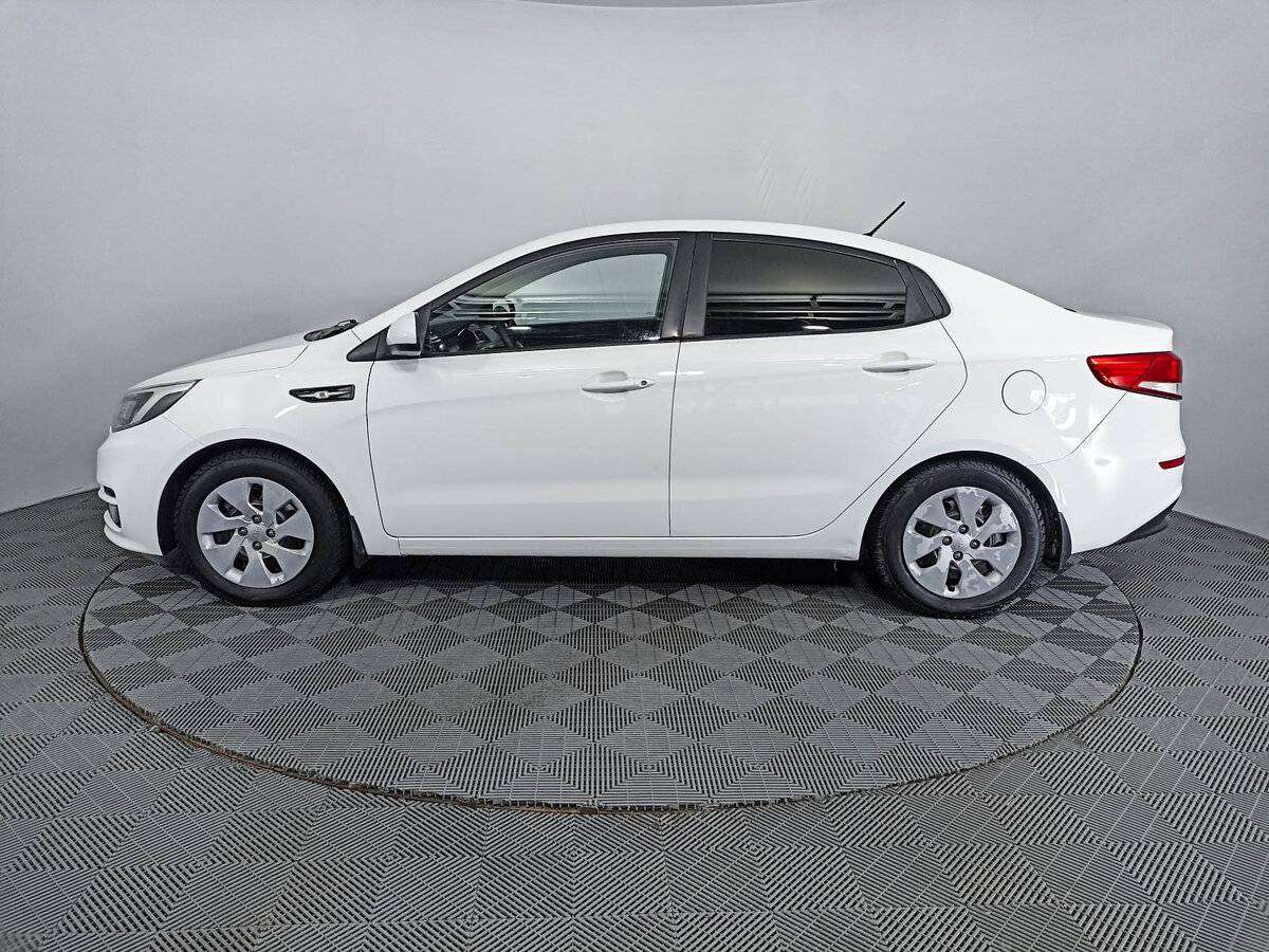 Kia Rio с пробегом — 2015 год. Фото: #7