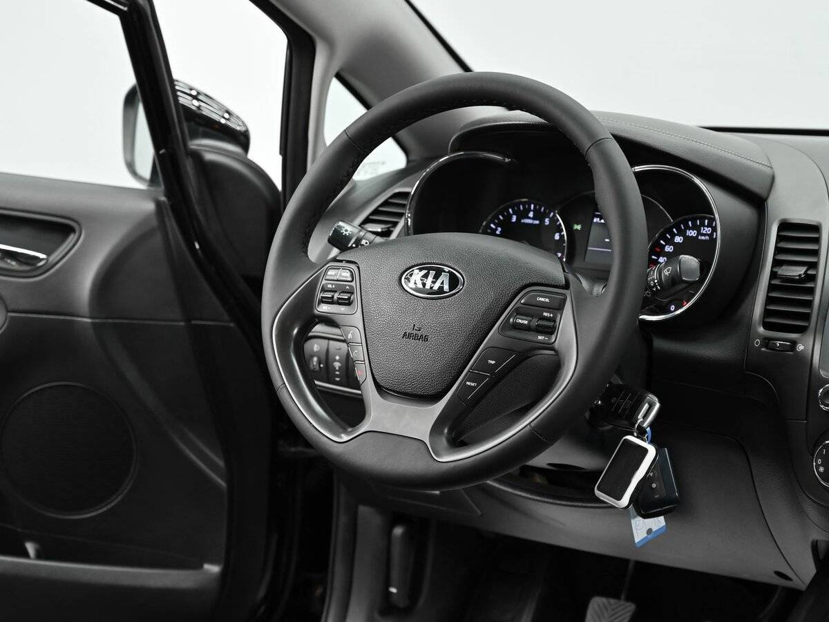 Kia Cerato с пробегом — 2015 год. Фото: #9