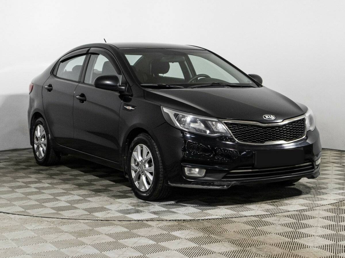 Kia Rio с пробегом — 2015 год. Фото: #2