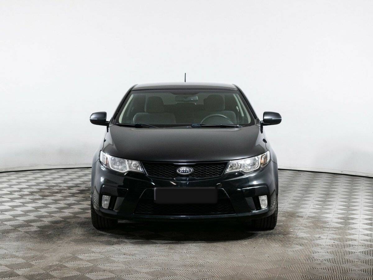 Kia Cerato с пробегом — 2012 год. Фото: #1