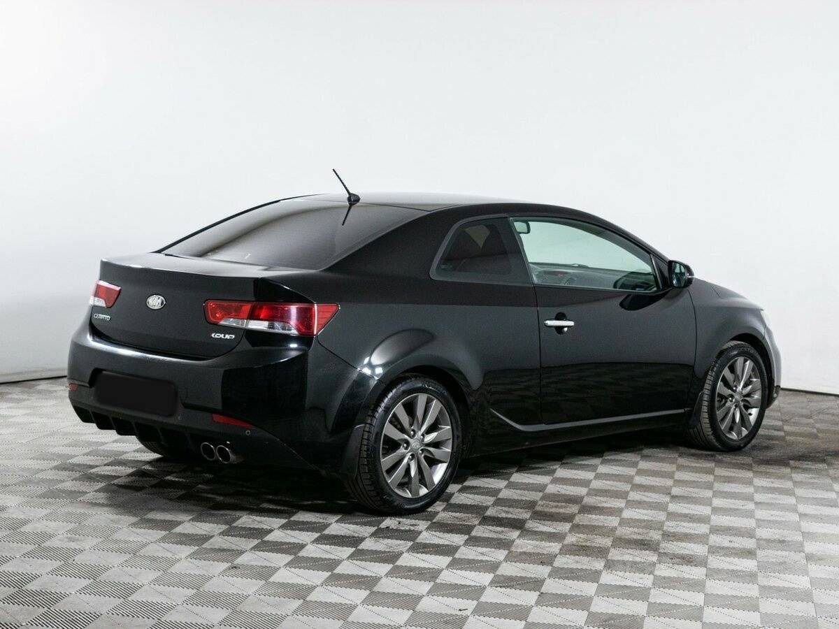 Kia Cerato с пробегом — 2012 год. Фото: #4