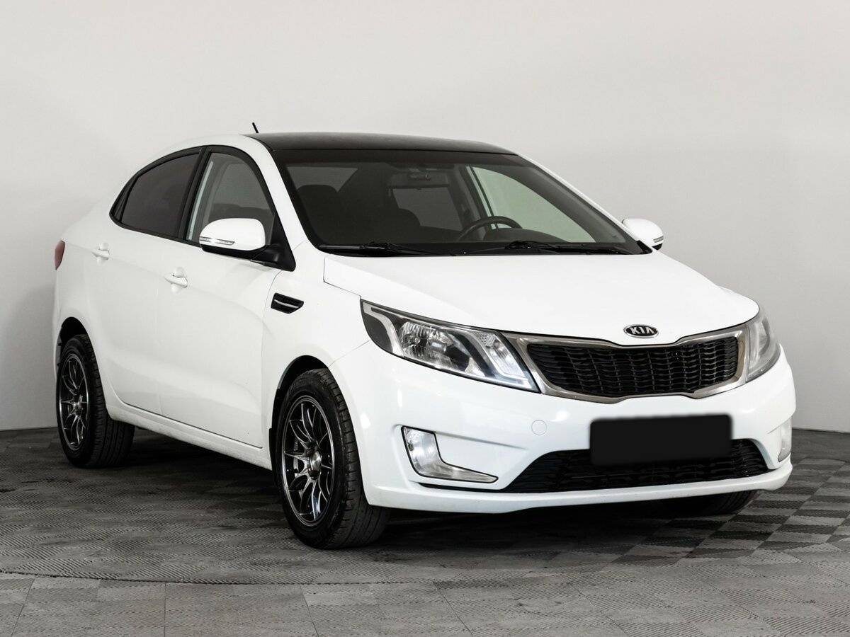 Kia Rio с пробегом — 2012 год. Фото: #2