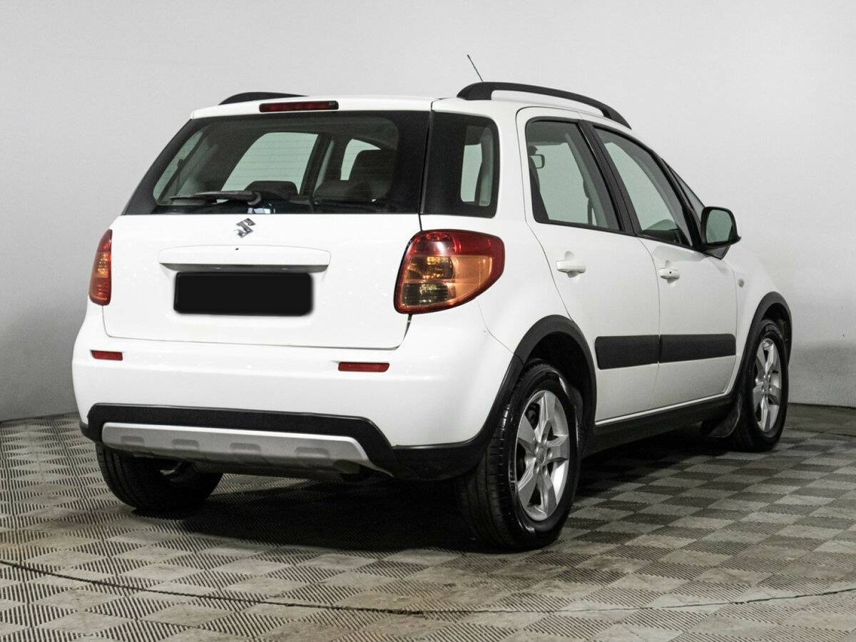 Suzuki SX4 с пробегом — 2013 год. Фото: #2