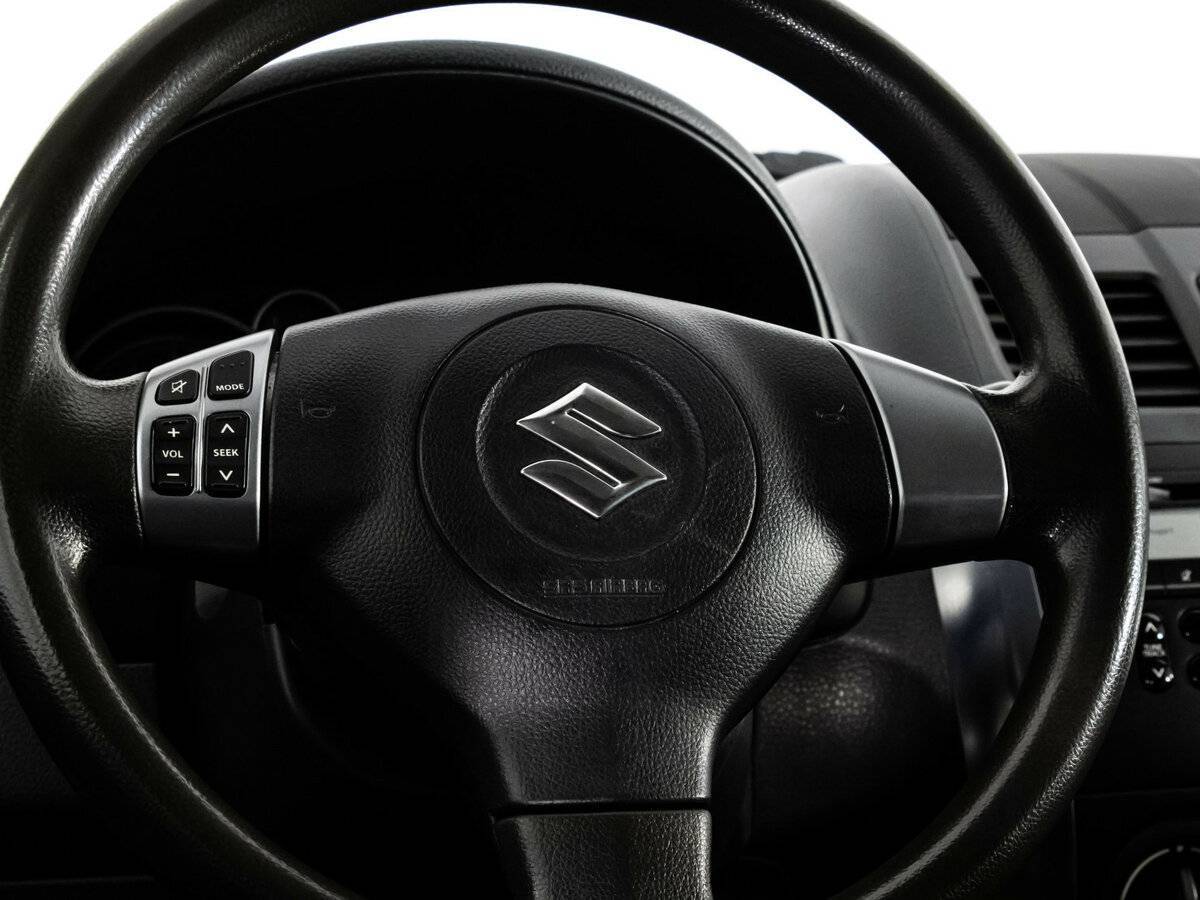 Suzuki SX4 с пробегом — 2012 год. Фото: #11