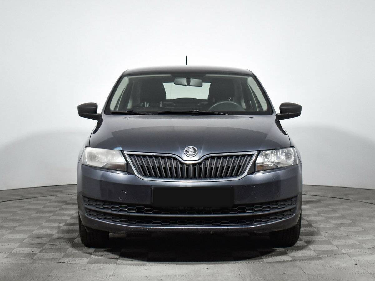 Skoda Rapid с пробегом — 2014 год. Фото: #1