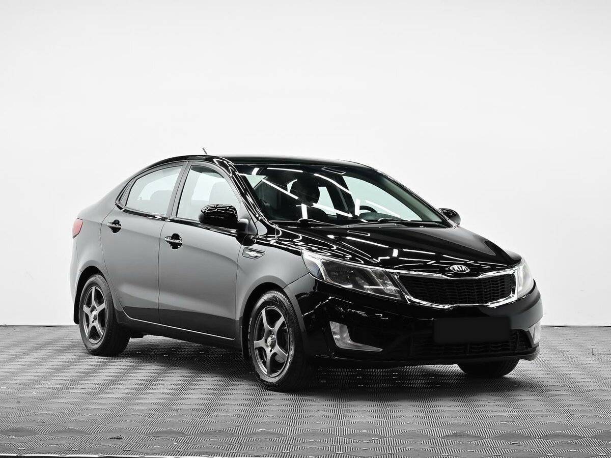 Kia Rio с пробегом — 2014 год. Фото: #1
