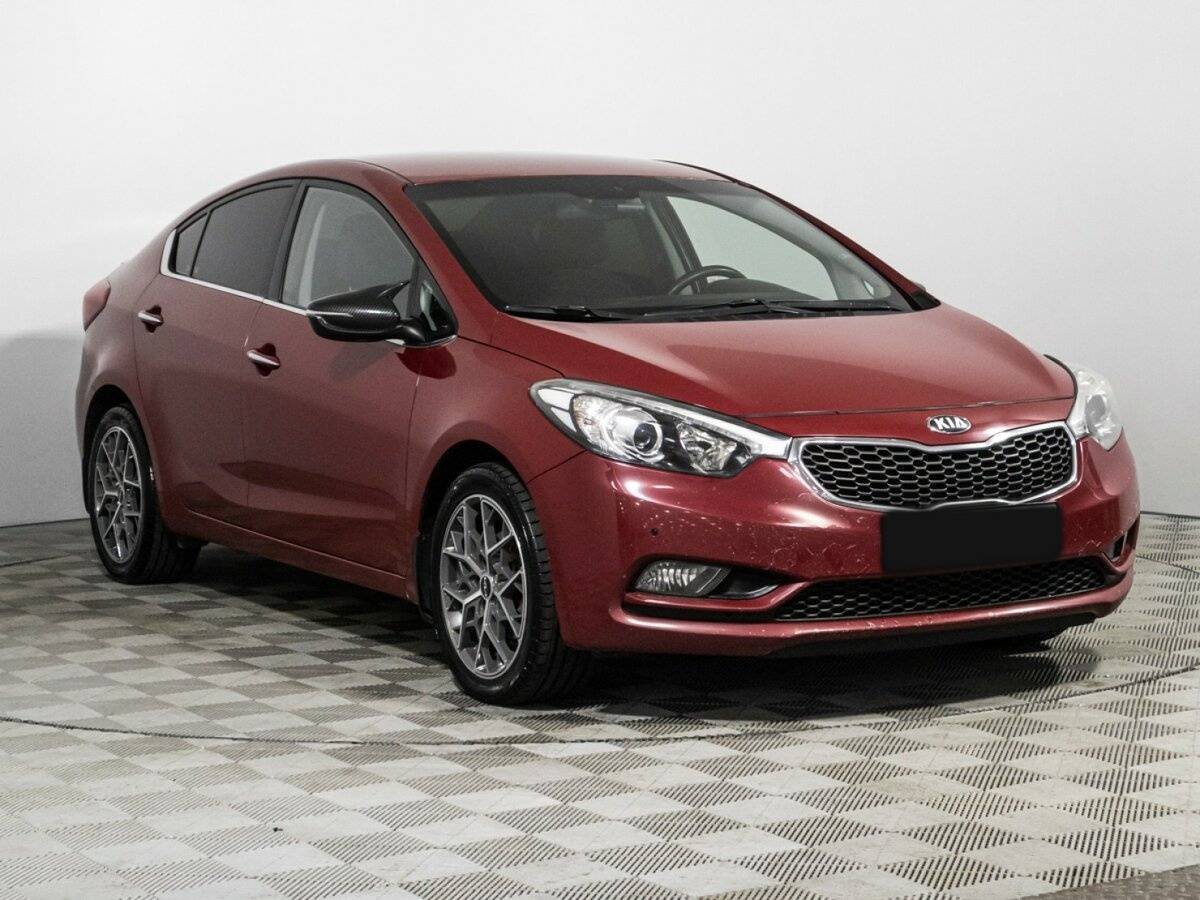 Kia Cerato с пробегом — 2014 год. Фото: #2