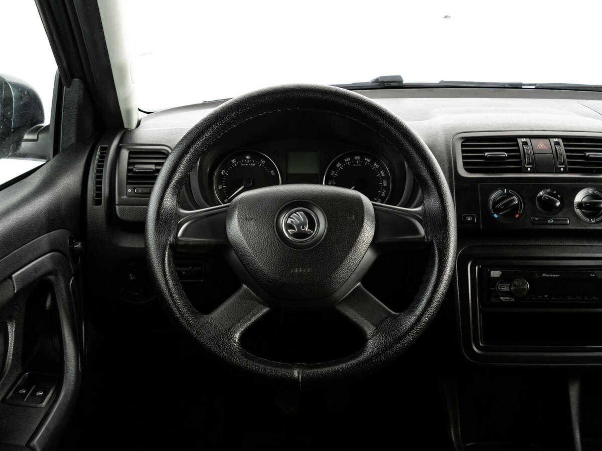 Skoda Fabia с пробегом — 2013 год. Фото: #10