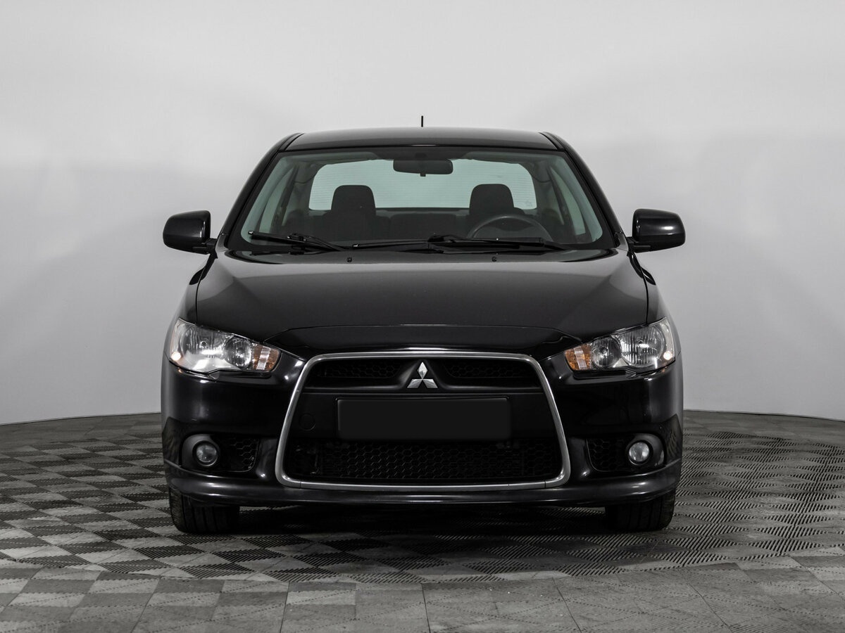 Mitsubishi Lancer с пробегом — 2012 год. Фото: #1