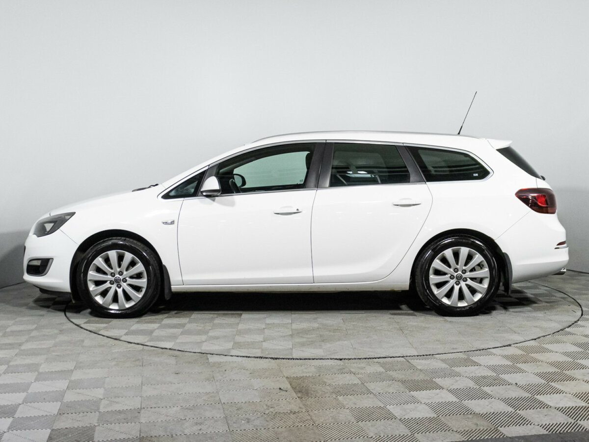 Opel Astra с пробегом — 2014 год. Фото: #7