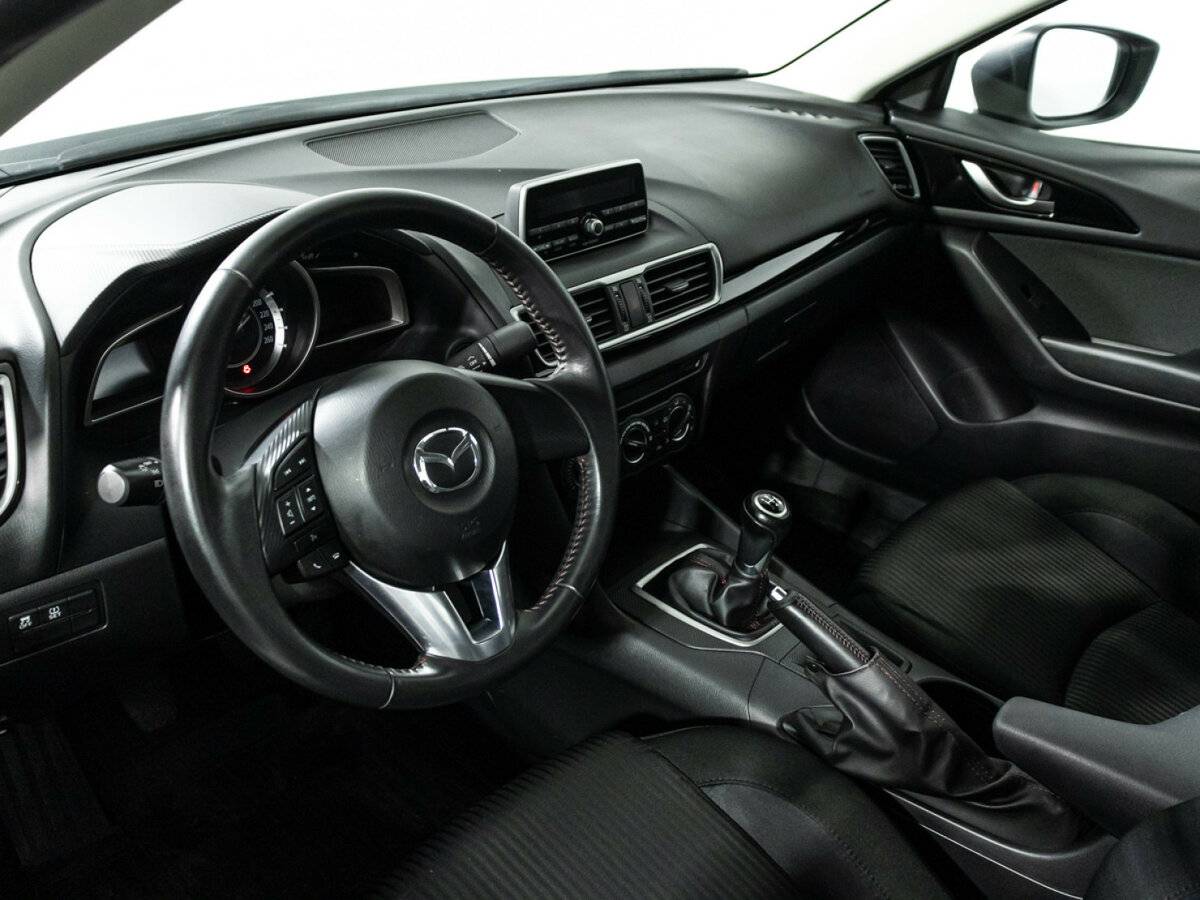 Mazda 3 с пробегом — 2014 год. Фото: #10