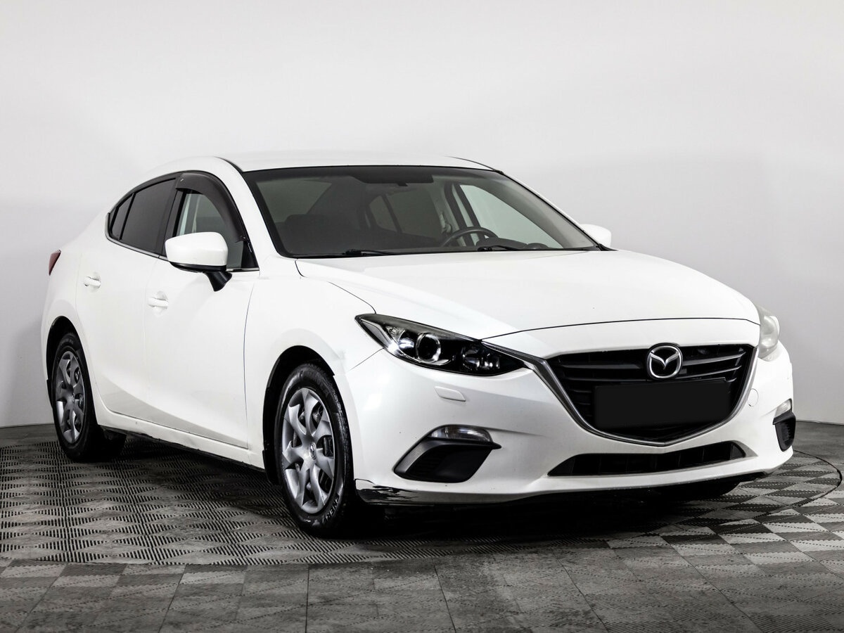 Mazda 3 с пробегом — 2013 год. Фото: #2