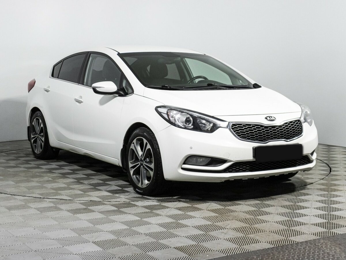 Kia Cerato с пробегом — 2015 год. Фото: #2