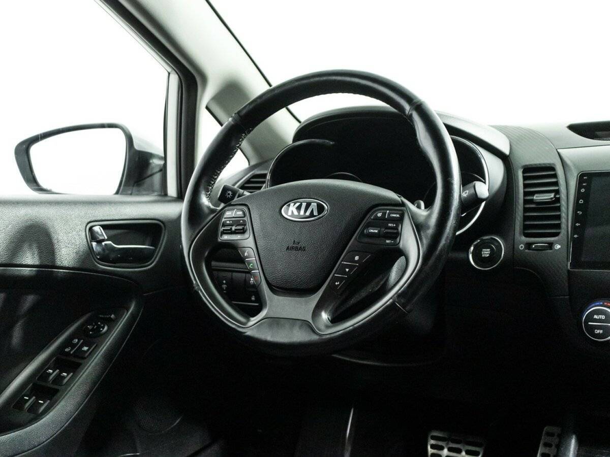 Kia Cerato с пробегом — 2015 год. Фото: #17