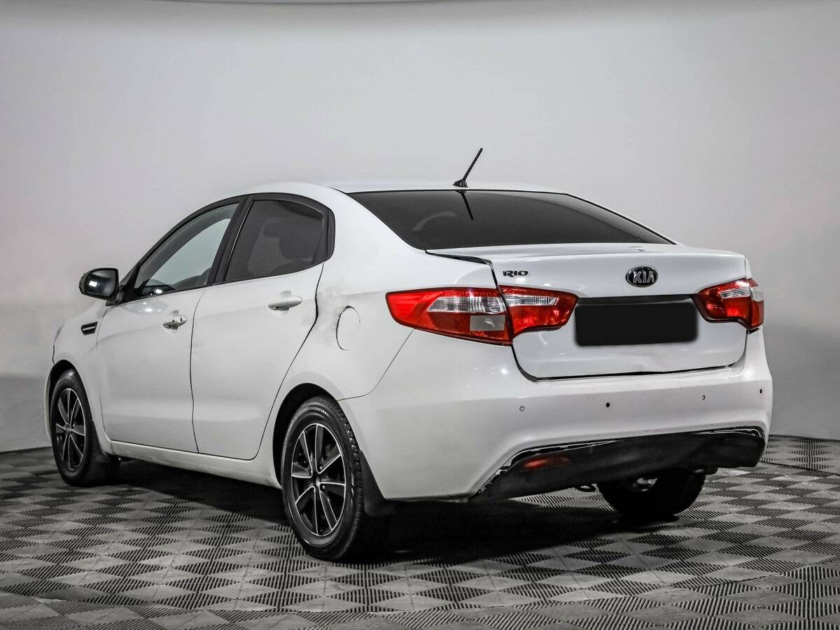 Kia Rio с пробегом — 2013 год. Фото: #5