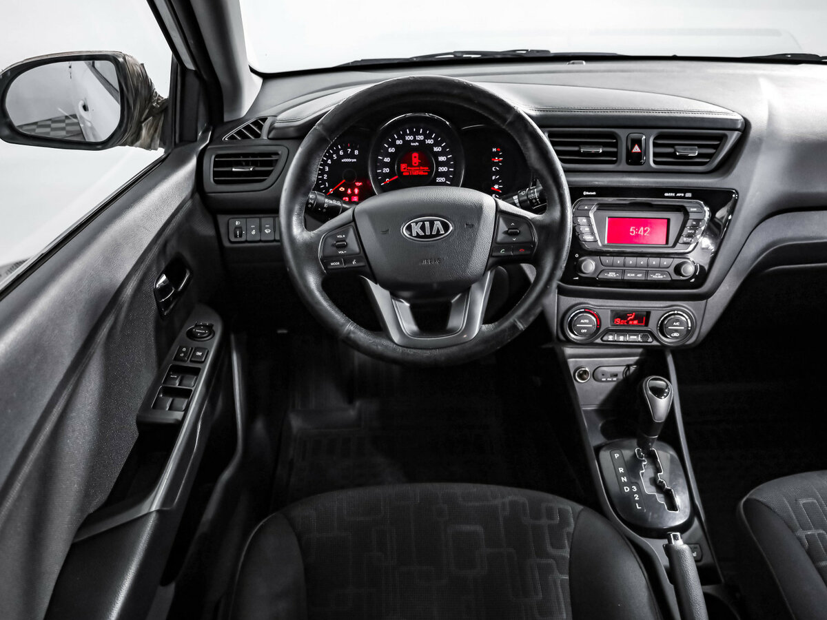 Kia Rio с пробегом — 2013 год. Фото: #8