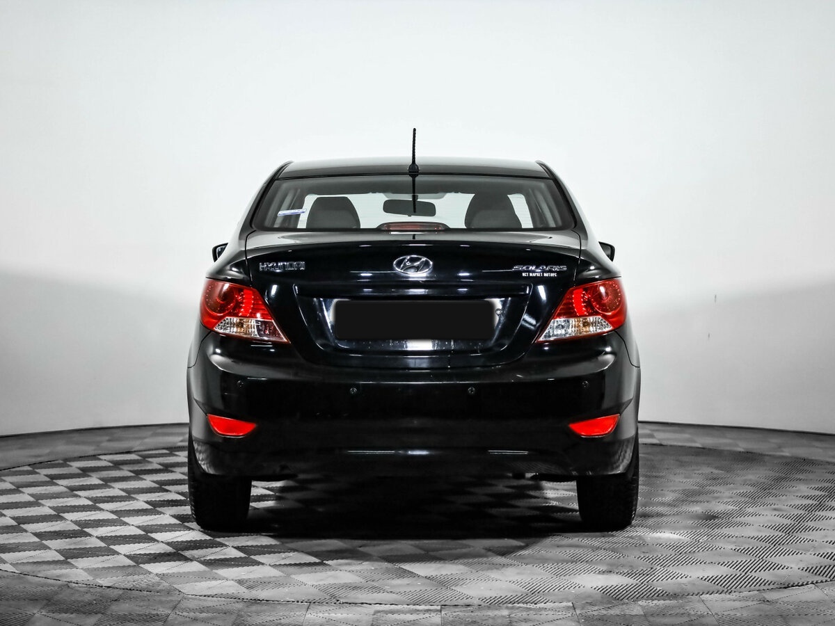 Hyundai Solaris с пробегом — 2013 год. Фото: #5