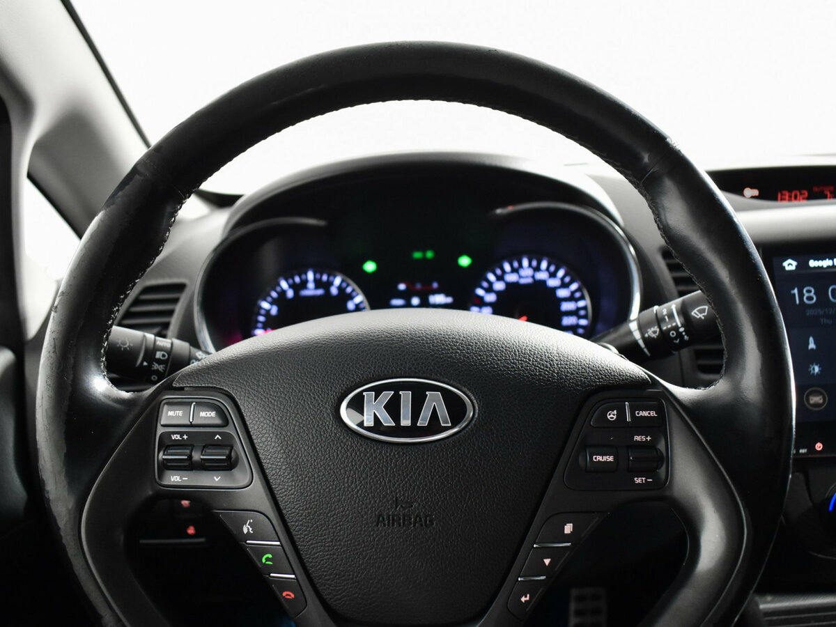 Kia Cerato с пробегом — 2014 год. Фото: #13