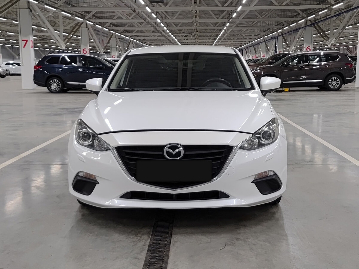 Mazda 3 с пробегом — 2014 год. Фото: #1