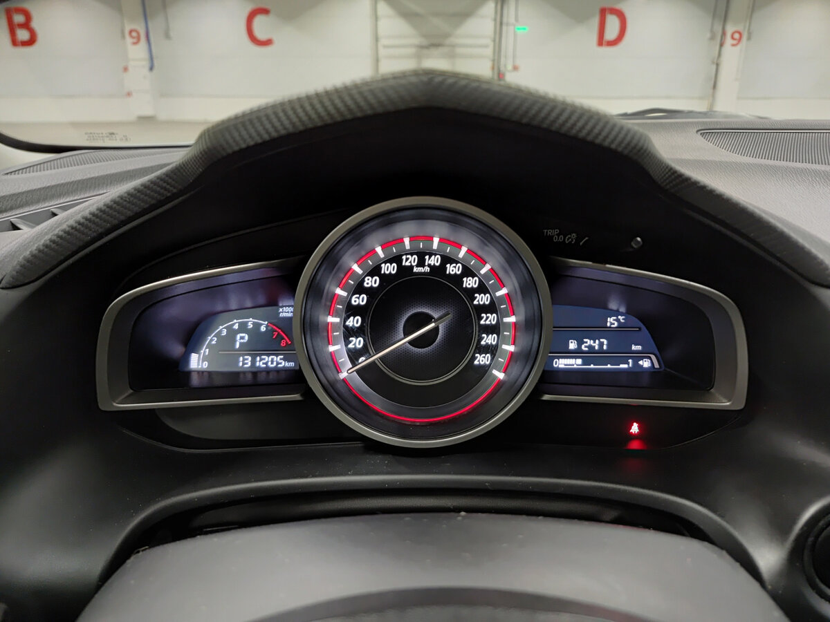 Mazda 3 с пробегом — 2014 год. Фото: #12