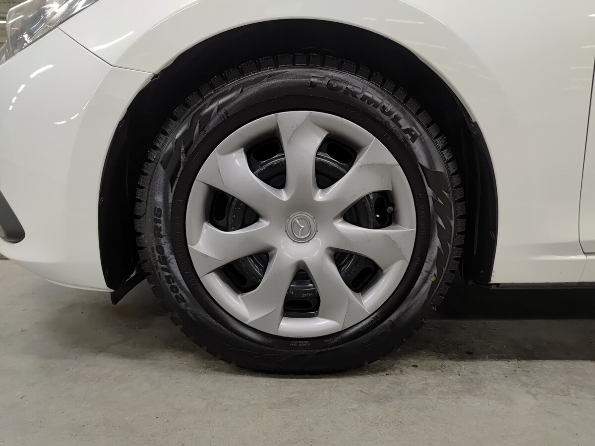 Mazda 3 с пробегом — 2014 год. Фото: #17